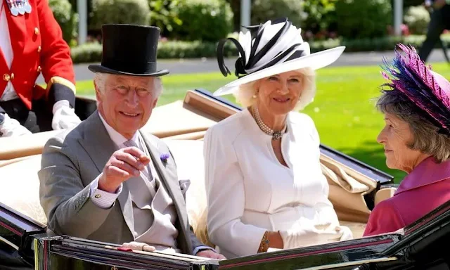 The Princess of Wales wore a red dress by Alexander McQueen. The Duchess of Edinburgh wore a pink dress. Princess Beatrice