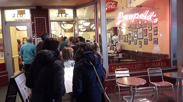 Photo of people waiting in line for ice cream.