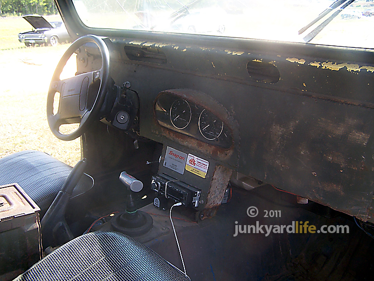 Mazda Miata gauges tucked into the CJ's dash