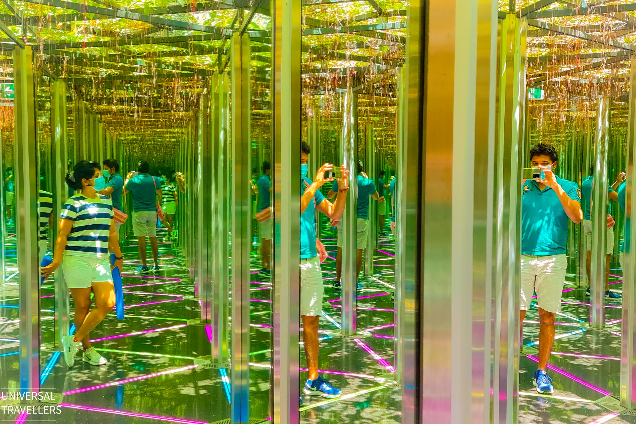 A girl is posing inside the Mirror Maze, located at level 5 inside the Jewel Changi Airport