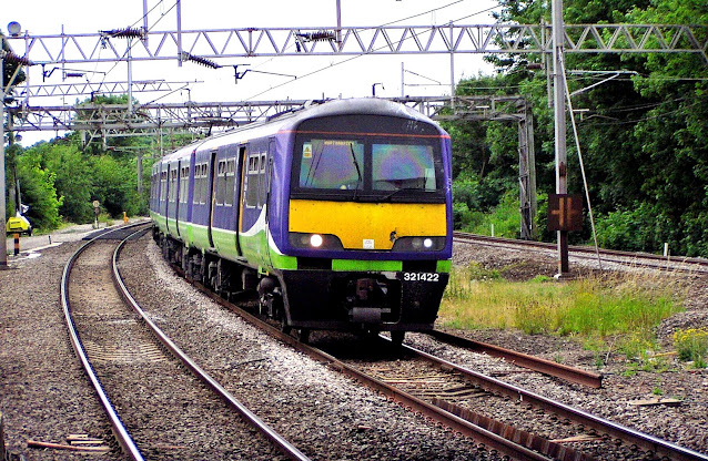 photo of silverlink trains class 321422 electric multiple unit entering wolverton station 1990s