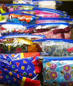 Dresses packed for Operation Christmas Child shoeboxes.