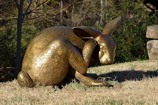 The hare of "Tortoise and Hare" sculpture by Nancy Schön