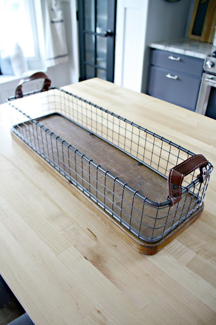 Metal and wood basket with leather handles