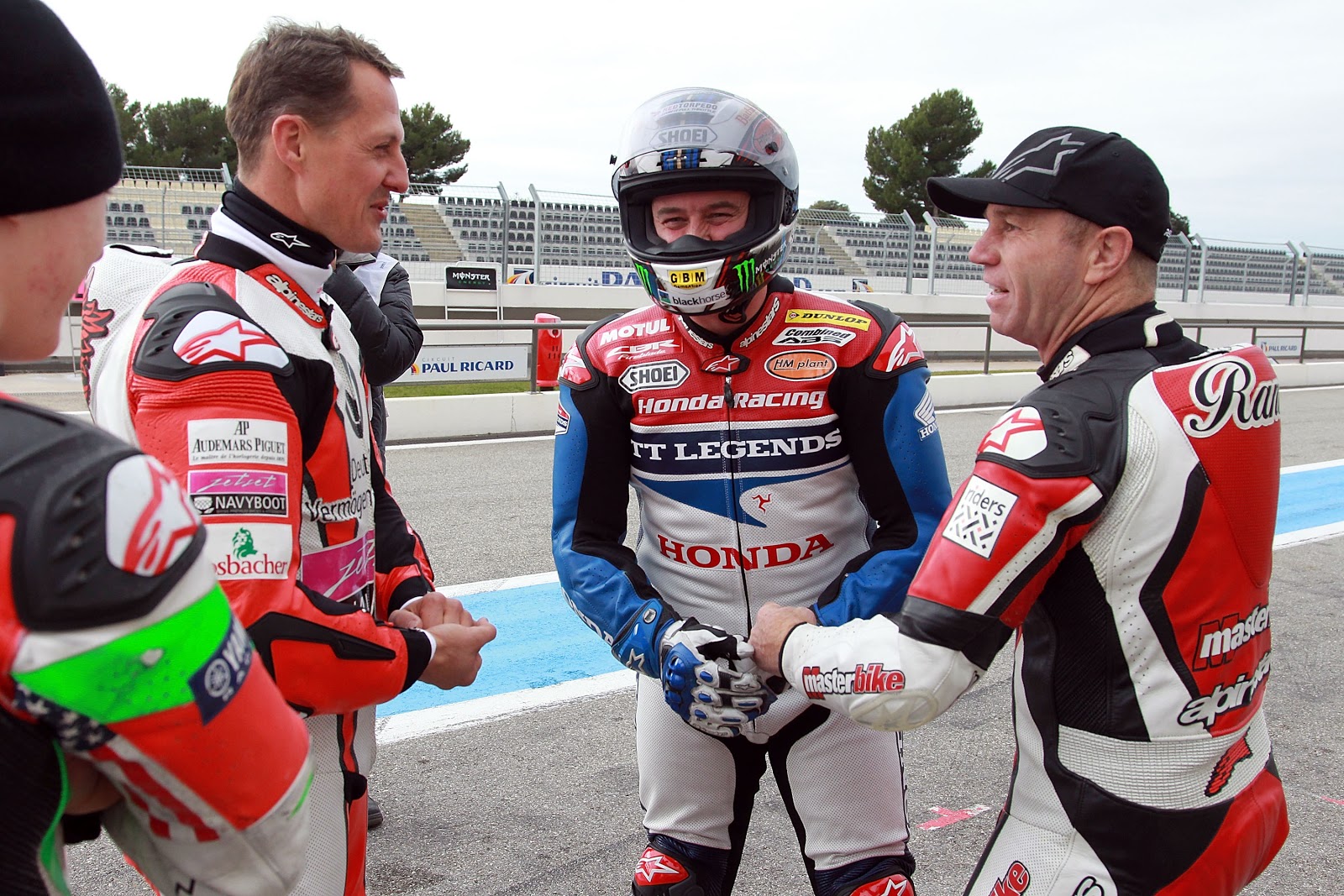 JOHN MCGUINNESS GETS A RUN OUT WITH F1 LEGEND MICHAEL SHUMACHER