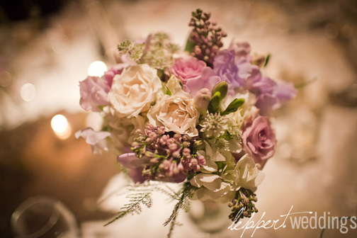 In this April wedding bouquet lavender and royal purple anemones with rich 