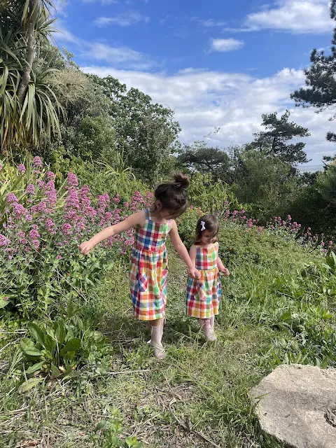 Children wandering through the flowers of Southend Cliff Gardens