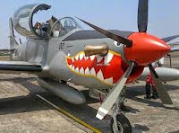 Pesawat Latih SuperTucano,Jatuh Saat Test Flight, ganti OC 10 Bronco, warna dasar loreng lukisan moncong cocor hiu warna merah