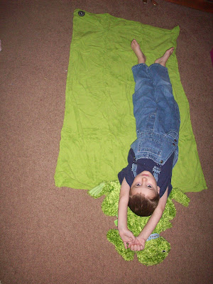 Little boy with Zoobies frog and blanket