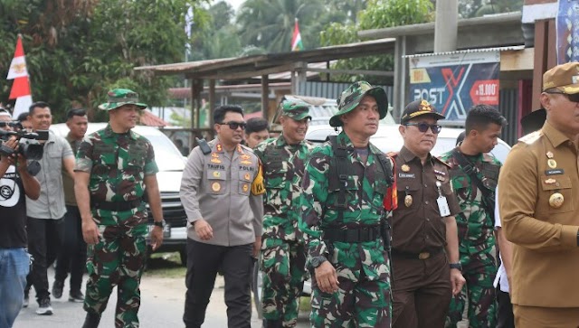 KAPOLRES BERSAMA PJ BUPATI BATU BARA HADIRI UPACARA TMMD KE-119 TA 2024