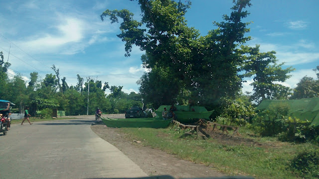 undistributed green boats at the MacArthur Memorial Park across DENR in Palo Leyte