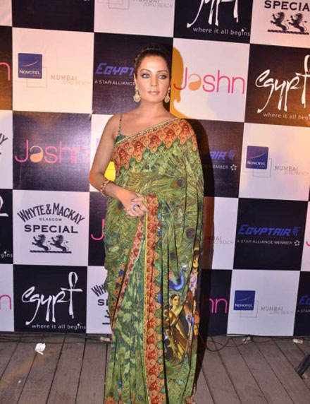 celina jaitley in backless green saari at launching jashns calendar hot images