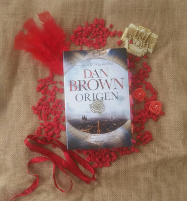 el origen libro de dan brown velas y piedras rojas