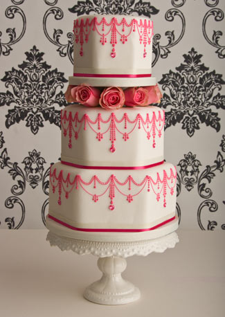 I love milk glasslike the stand on this vintage look cake with ribbons 