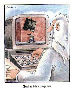 God at His computer