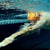 How does swimming improve our balance?