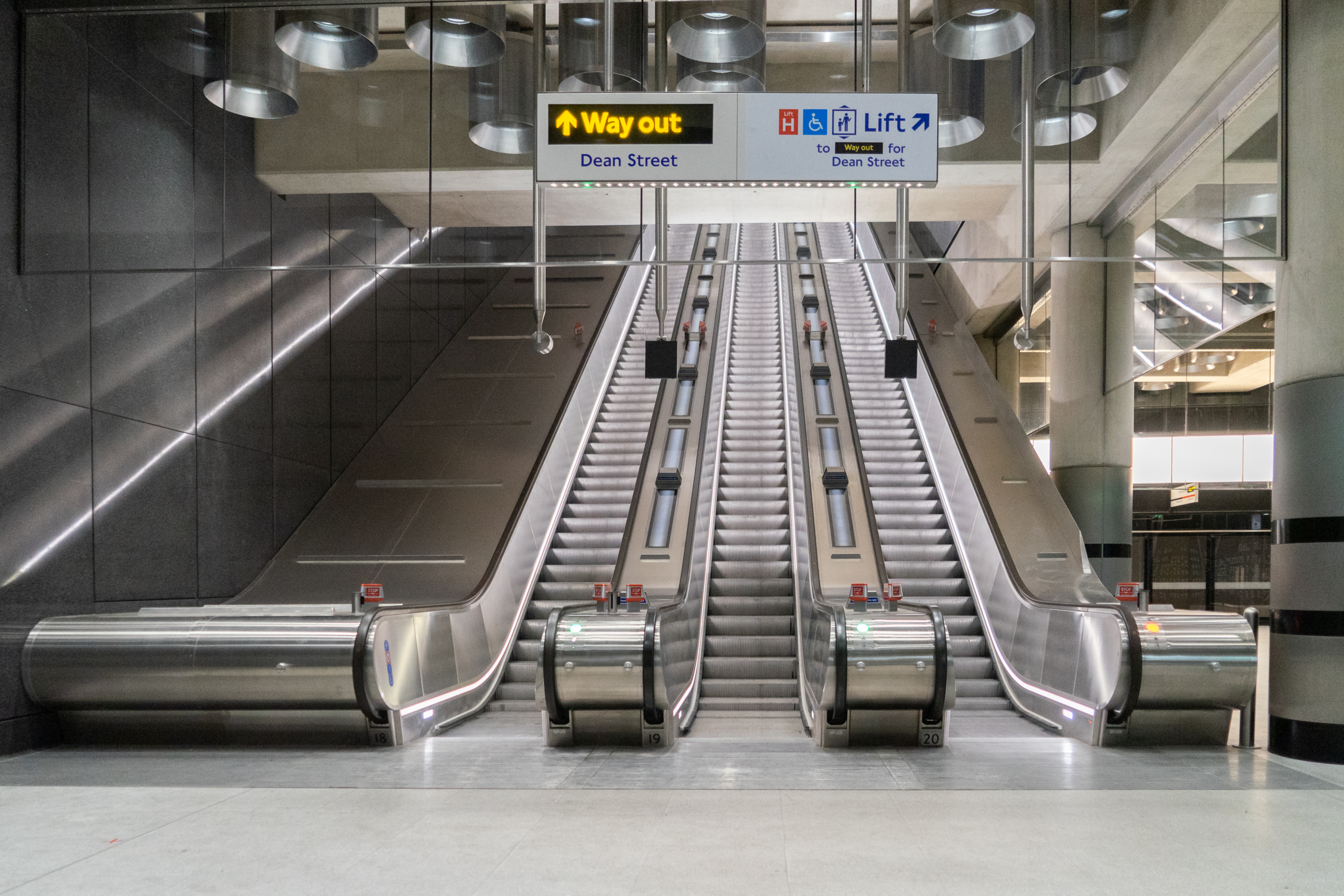 Up white petticoat on escalator