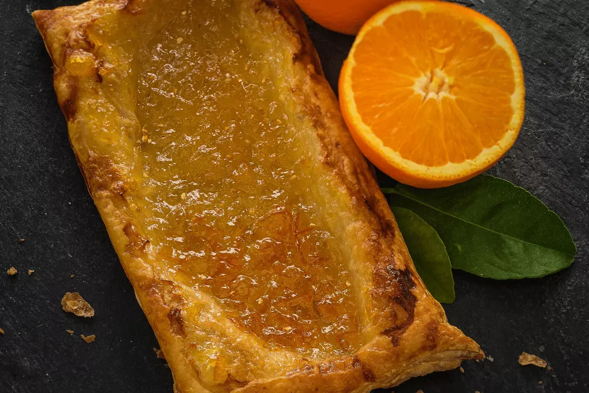 Orange jam Jus Rol puff pastry on stone background