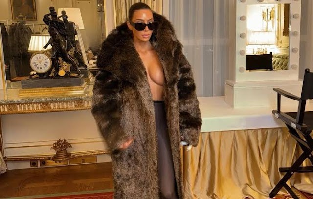 Kim Kardashian Emulates Bianca Censori, Kanye West's Spouse, in Fur Coat and Tights Ensemble