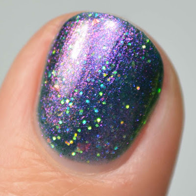 teal based multichrome nail polish swatch close up