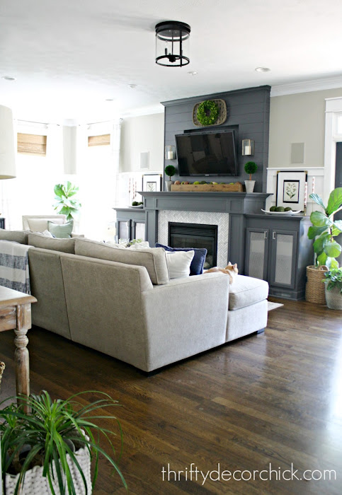 open family room with gray fireplace