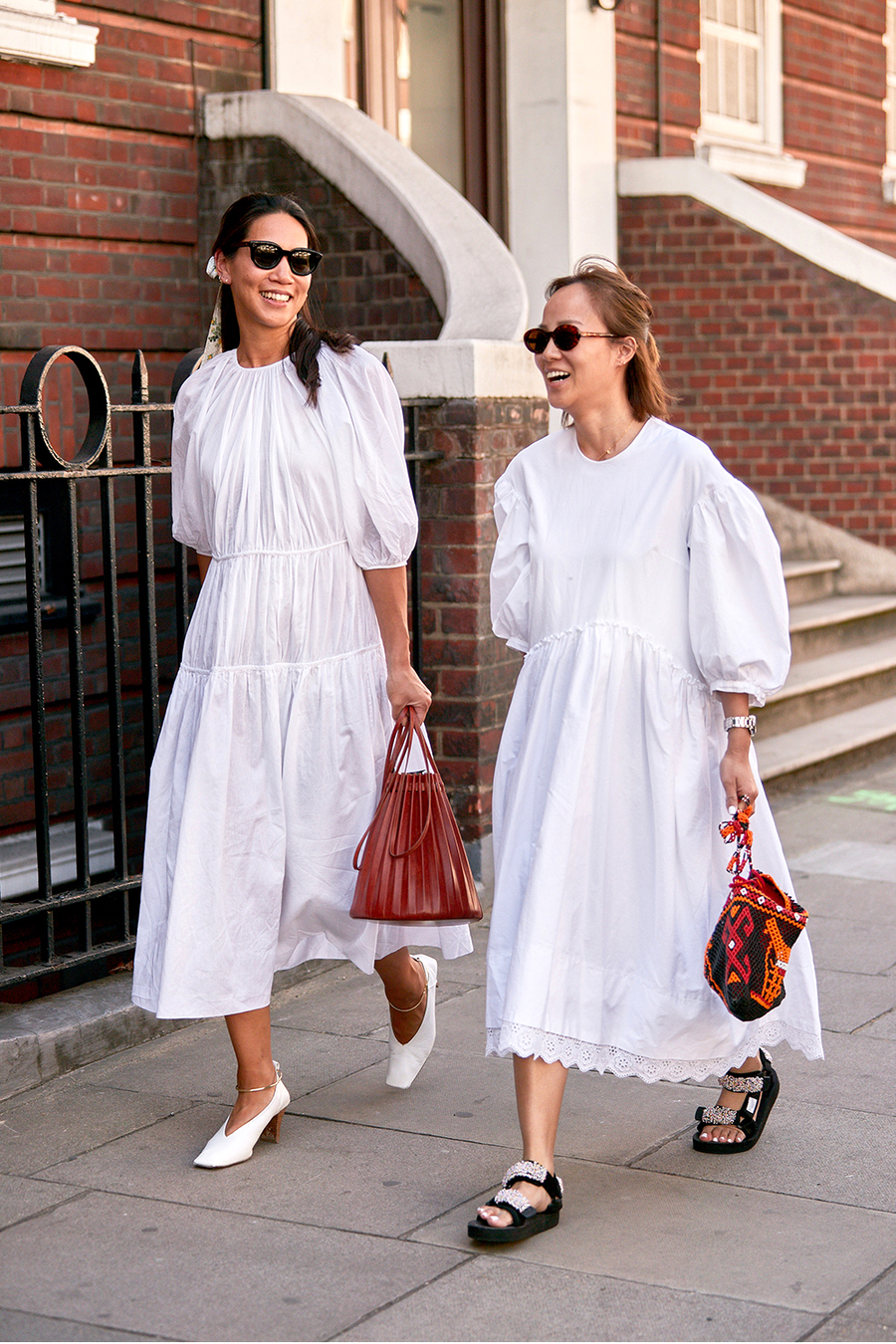25 Voluminous White Dresses for Spring and Summer — Street style outfit ideas with puffed sleeves and billowy skirt, mini bag, and sandals
