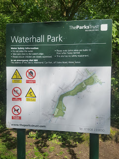 A sign in the Parks Trust Waterhall Park South Car park