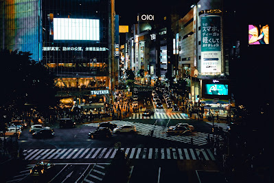 Busy intersection at night