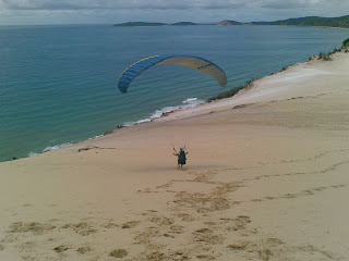 Local French dude, Guy, launches from Carlo Sand Blow, Rainbow Beach