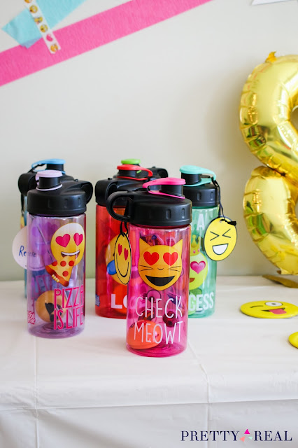 water bottles as party favors at an emoji birthday party