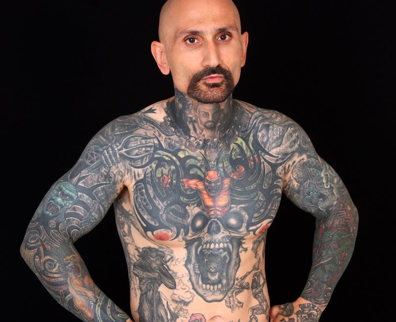 satanic tattoos. covered in tattoos,