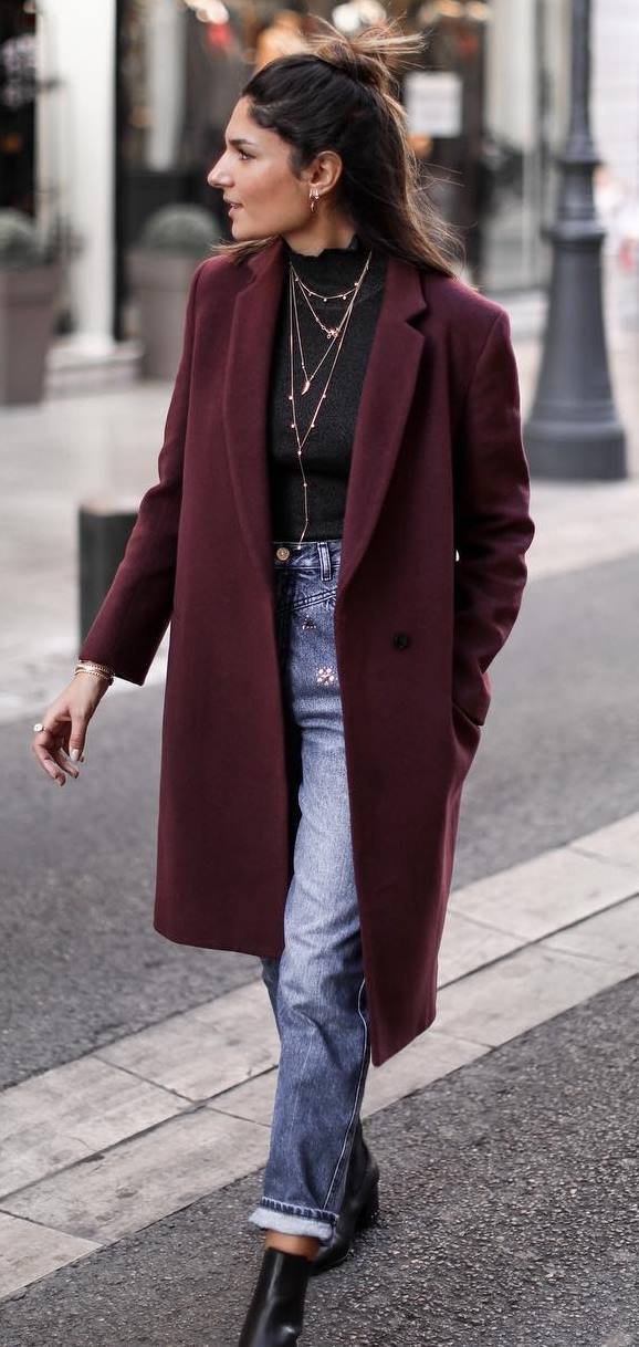 winter fashion trends / maroon coat + black top + jeans + boots