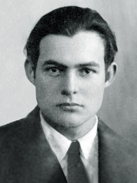 1923 photograph of Ernest Hemingway, public domain, via Wikimedia Commons