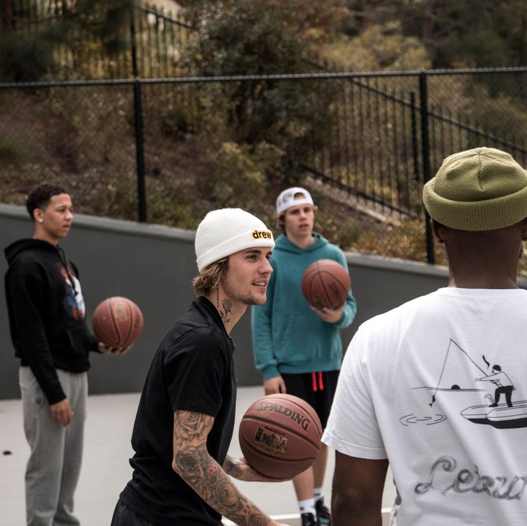 Justin Bieber uses his spare time to play basketball with his friends .. Pictures