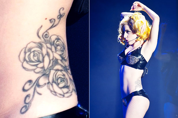 Lady Gaga Back Tattoo: Click to Close that covers areas of her lower back 