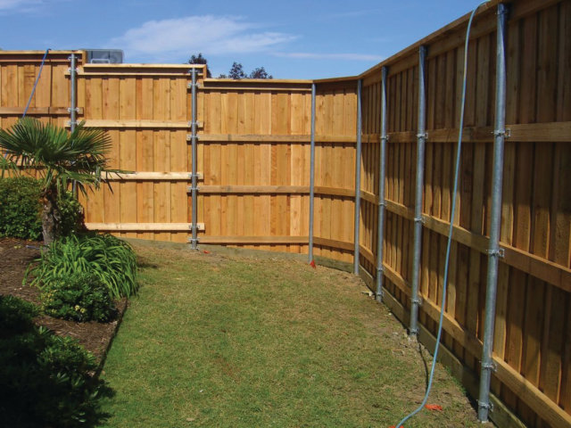 The Fence Line: Building a Wood Fence with Metal Posts?