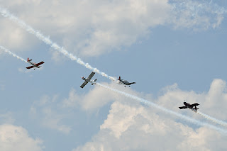 picture of Jerry Morris, Ron Schreck, and Mike Stewart from Team RV at the Evansville Freedom Festival flying in close formation