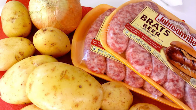 Ingredients for Sheet Pan Brats & Potatoes sitting on a cutting board