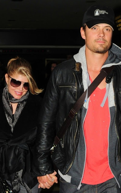 Fergie and Josh Duhamel arriving at LAX Airport