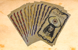 Fanned out cards from the Scarlett's Revenge Card Deck