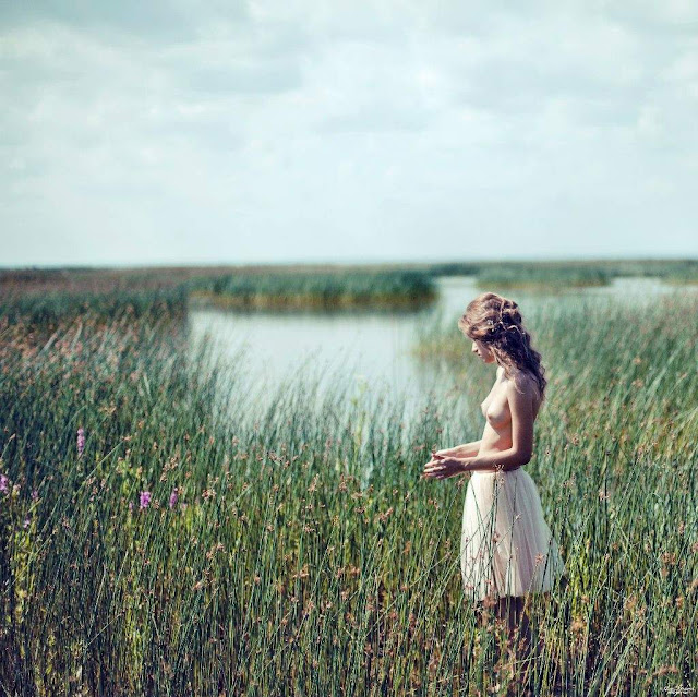 Gracile girl near the backwaters