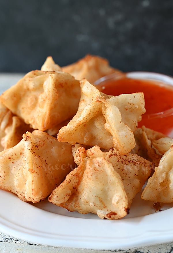 Chinese crab rangoon served with sweet and sour sauce