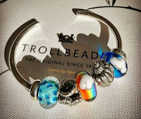 Logo Trollbeads : ogni settimana vinci gratis bead omaggio