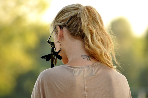 I think these little bow tattoos are really pretty. I think I want one now.