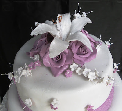 Three Tier Wedding Cake A Lily with Purple Roses October 2008