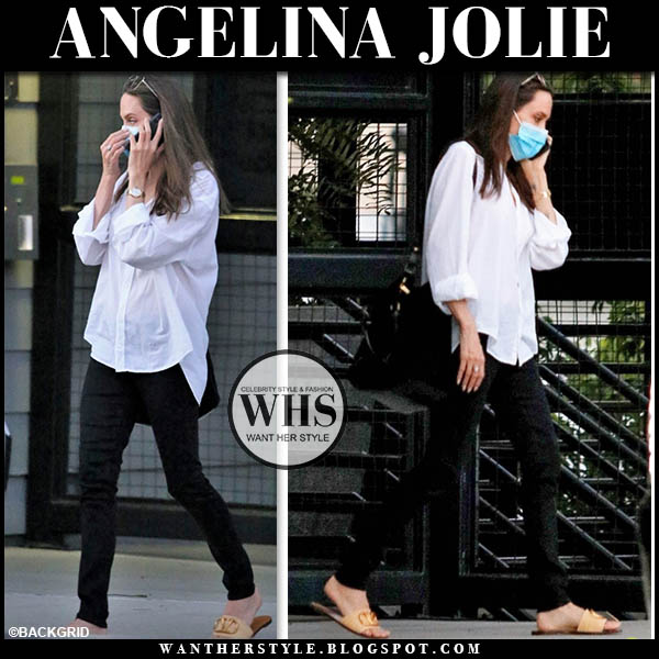 Angelina Jolie in white shirt, black jeans and tan sandals