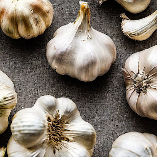 Garlic has been used for centuries for both culinary and medicinal purposes. It contains a compound called allicin, which has antibacterial and antifungal properties.  Studies have shown that regular consumption of garlic may help lower cholesterol levels and reduce the risk of heart disease.