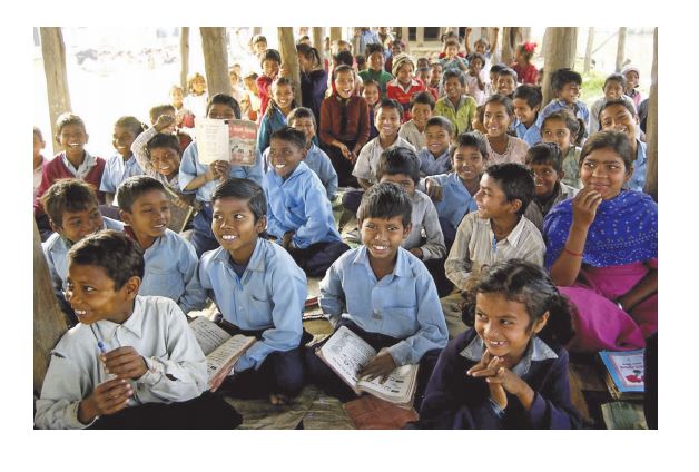 Students attending class in open classroom due to lack of infrastructure in Nepal