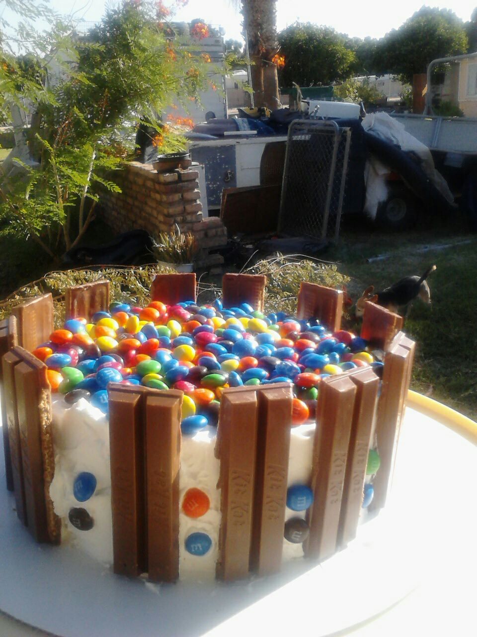 Mediocre KitKat cake in front of junk