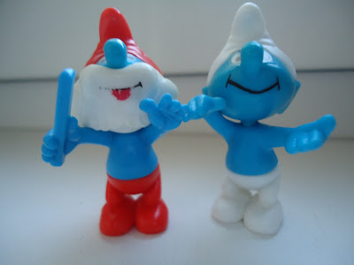 2 Smurf figures - Papa Smurf and Smiling Smurf